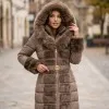 Дълго дамско елегантно зимно яке в бежов цвят с богата пух на качулката, кожени детайли и колан-2099